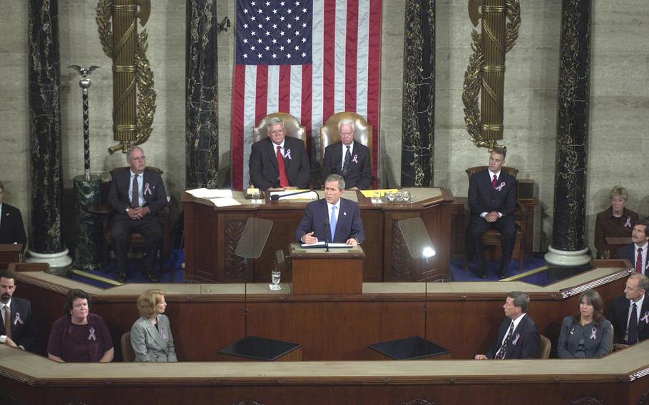 President George W. Bush looks towards the balcony during his address to a joint session of Congress, Thursday night, November 20, 2001.