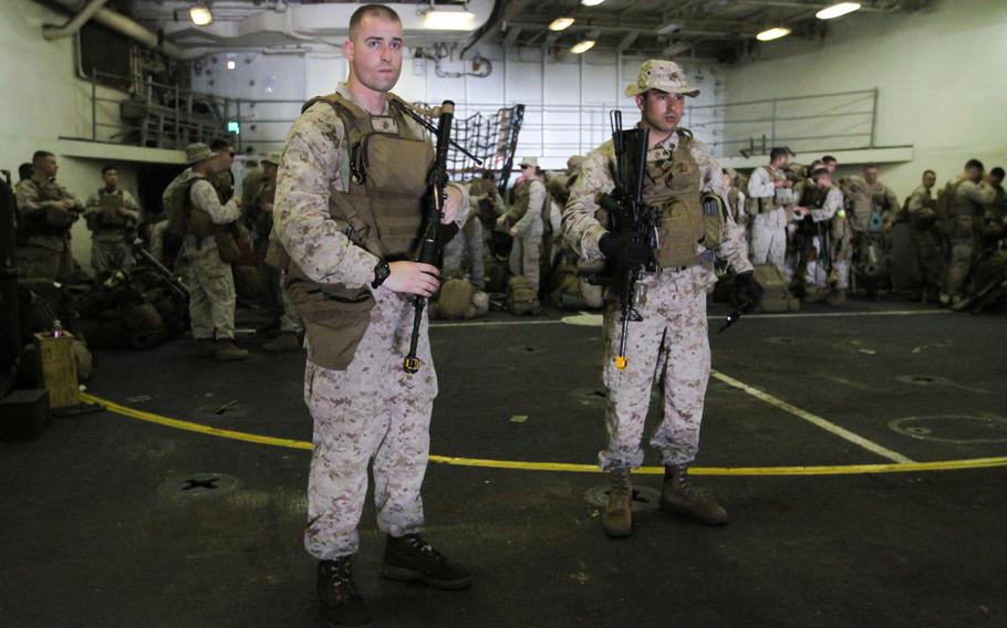 U.S. Marines from the 22nd Marine Expeditionary Unit on the dock landing ship USS Gunston Hall prepare to participate in an exercise in Djibouti, April 15, 2014. Sailors and Marines on lengthy deployments began accruing a new allowance on Wednesday, Sept. 17, 2014, aimed at making long tours at sea more tolerable.