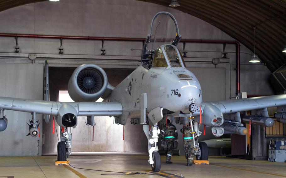 Air Force airmen maintenance crew performs a check one of the 25th Fighter Squadron?s A-10 Thunderbolt II during the Beverly Bulldog 14-04 exercise at Osan Air Base, South Korea, on Sept. 18, 2014.