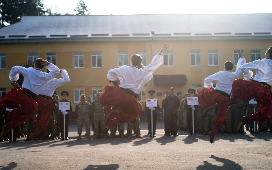 Traditional Ukrainian dancers perform a traditional dance for the participants of Rapid Trident 2014 during the exercises opening ceremony Sept. 15, 2014. Rapid Trident is an annual U.S. Army Europe conducted, Ukrainian led multinational exercise designed to enhance interoperability with allied and partner nations while promoting regional stability and security.