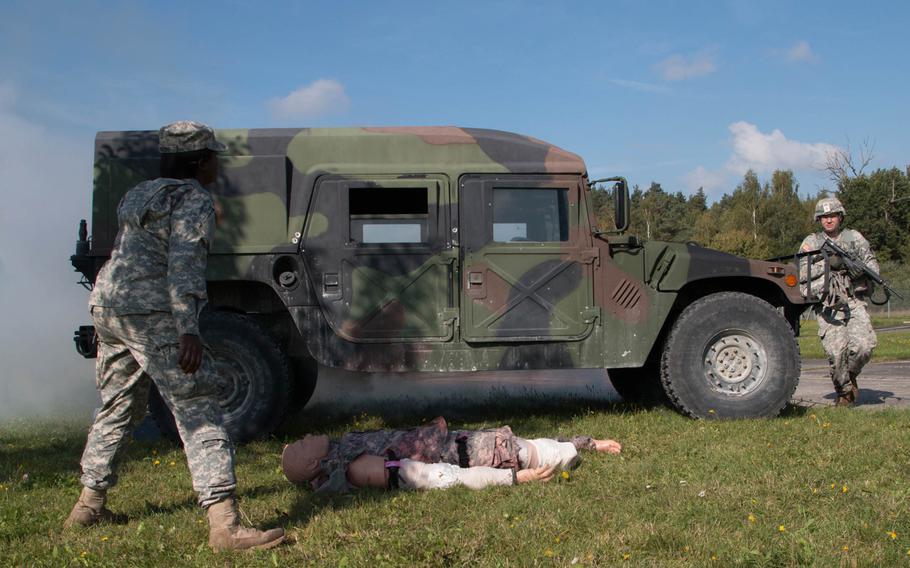 A simulated casualty evacuation such as this one was among the challenges facing U.S. Army Europe's top soldiers during USAREUR's "Best Warrior" competition Sept. 14-19, 2014, in Grafenwöhr, Germany.