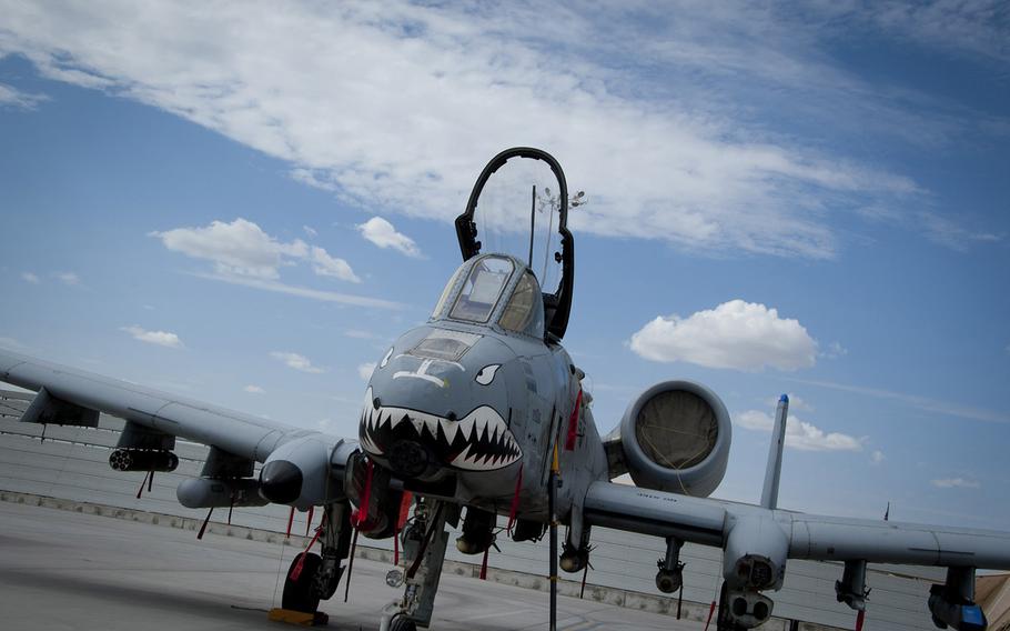 An A-10 Warthog sits on the flightline at Kandahar Airfield, Afghanistan, Sept. 2, 2011. The A-10's wide combat radius and short takeoff and landing capability permit operations in and out of locations near front lines.