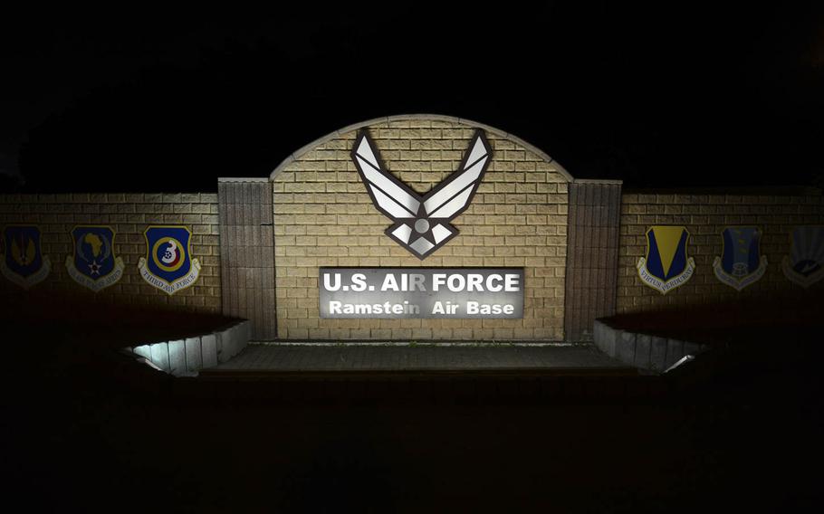 A wall showcasing the outside of Ramstein Air Base, Germany,  is lit up in the dark on June 18, 2014.