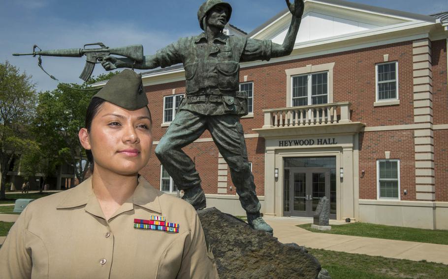 Marine Sgt. Jennifer Suarez stands in front of Haywood Hall at The Basic School in Quantico, Va., May 8, 2015. Suarez recently returned to active duty following a long battle with brain cancer.