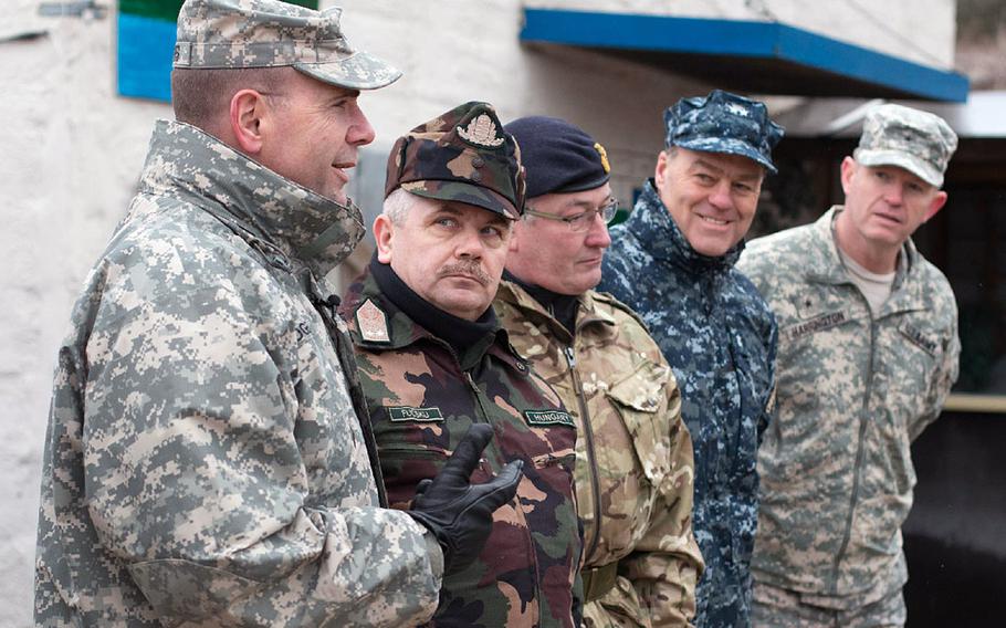 Lt. Gen. Ben Hodges, U.S. Army Europe commander, left, Hungarian Defense Force Joint Force Command commander Maj. Gen. Sandor Fucsku, British Maj. Gen. David Cullen, U.S. Navy Rear Adm. John N. Christenson and the deputy chief of staff of operations for the Allied Rapid Reaction Corps, U.S. Army Brig. Gen. Joseph Harrington, field questions at the training grounds at Hohenfels, Germany, during Allied Spirit I, Jan. 23, 2015.