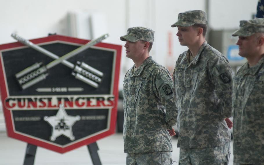 Five soldiers from the 2nd Battalion, 159th Aviation Regiment ''Gunslingers'' were presented with the German Medal for Flood Relief 2013 by U.S. Army Europe Chief of Staff, German Brig. Gen. Markus Laubenthal, on Feb. 24, 2015.