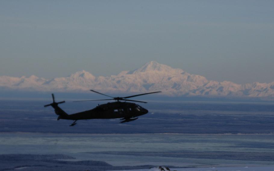 An Alaska Army National Guard UH-60 Black Hawk helicopter flies past Mount McKinley, the highest mountain in North America on Feb.13, 2015. Alaska is the most dangerous state for pilots, statistics show.