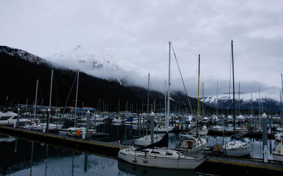 The marina at Seward, Alaska, is backed by stunning mountain scenery. The U.S. military resort in Seward has its own fleet of charter fishing boats — launched from a military dock in the harbor — that take guests out to hook halibut, salmon, rockfish and ling cod