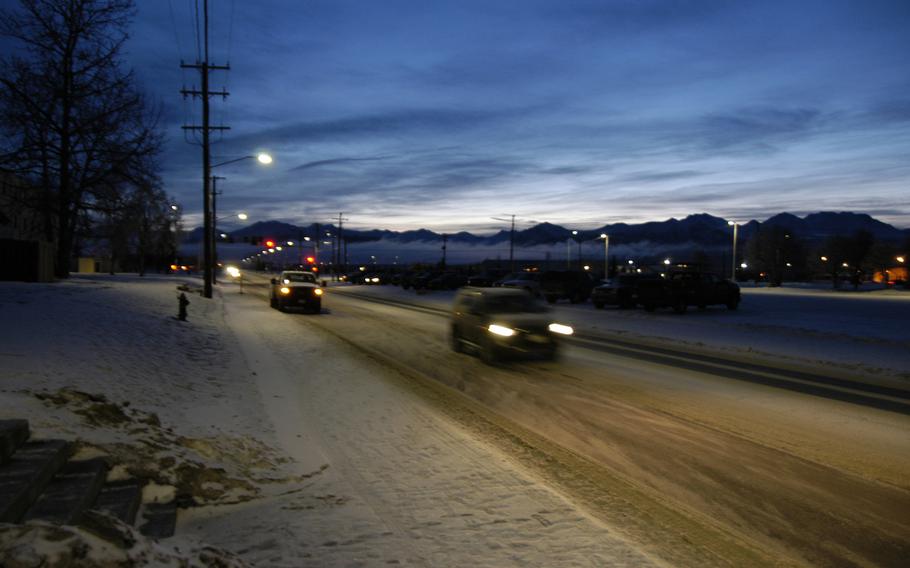 Early morning traffic on Joint Base Elmendorf-Richardson in February 2015.  Many who are stationed there choose to return to the area after leaving the service. The 49th state is home to more than 76,000 veterans.