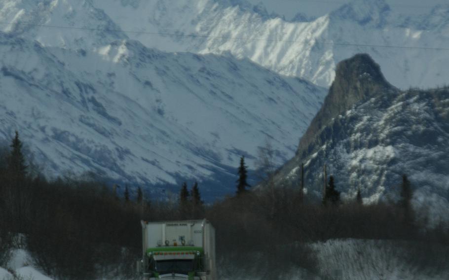 A big rig rolls along the highway between Anchorage and Delta Junction, Alaska, in February 2015.