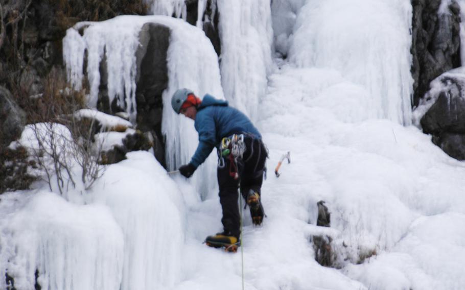 An ice climber near Anchorage, Alaska, in February 2015.  Outdoor activities are big among military members stationed there.