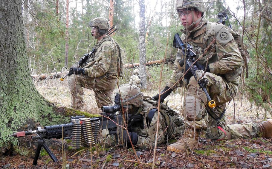 Soldiers from 3rd Squadron, 2nd Cavalry Regiment, maneuver through a forest toward an enemy stronghold as part of a combined training exercise with Estonian Allies in support of Operation Atlantic Resolve, March 7, 2015, in Rabassare, Estonia. The unit is planning an 1,100-mile trek from Poland and the Baltic nations back to its home base in Viseck, Germany.