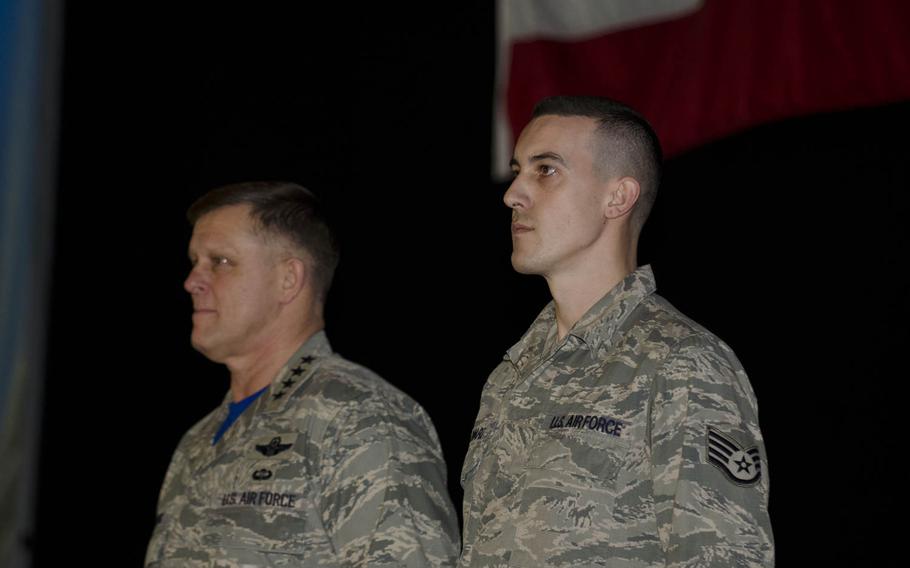 U.S. Air Force Staff Sgt. Greggory Swarz, right, stands with Gen. Frank Gorenc, commander of U.S. Air Forces in Europe-Air Forces Africa, who presented Swarz the Airman's Medal on Friday, March 13, 2015, at RAF Lakenheath, England. Swarz was awarded the medal for helping to rescue three French airmen after a crash and ensuing fire during a multinational exercise in Spain in January.