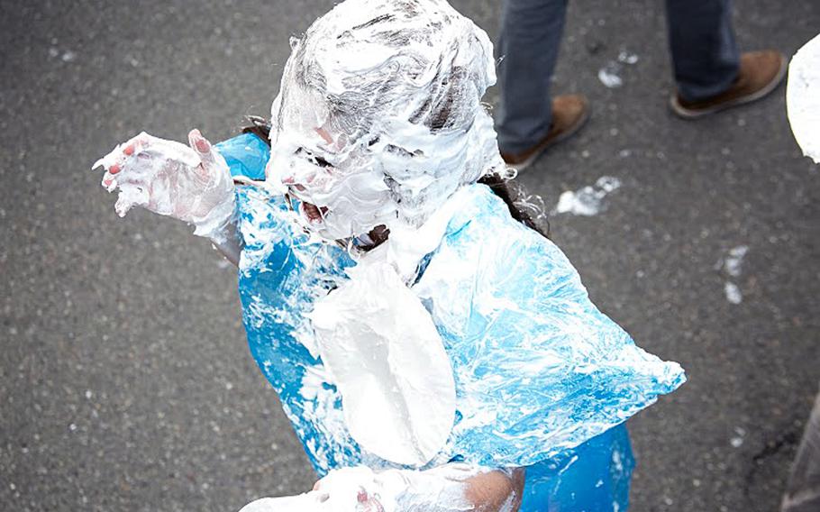 A Patch High School student is rendered unrecognizable during a March 12, 2015, shaving cream pie fight on Patch Barracks, Stuttgart, Germany. Students attempted to set a new world record for such pie fights.

Courtesy  Virginia Kozak