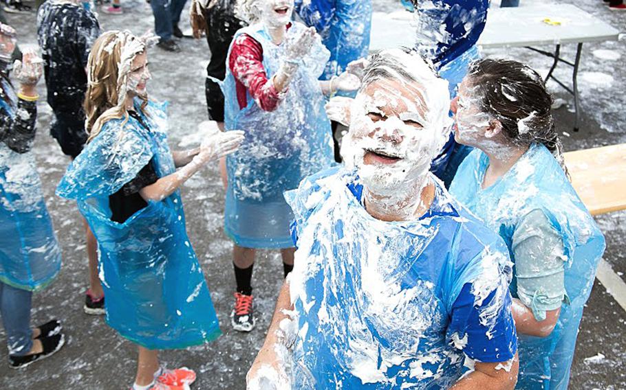 Patch High School Principal Danny Robinson couldn't escape the shaving cream during the pie fight on March 12, 2015, at Patch Barracks, Germany. The event, sponsored by the schools math honors society, was part of an effort to commemorate "Pi Day," which celebrates the mathematical constant 3.14. 

Courtesy Virginia Kozak