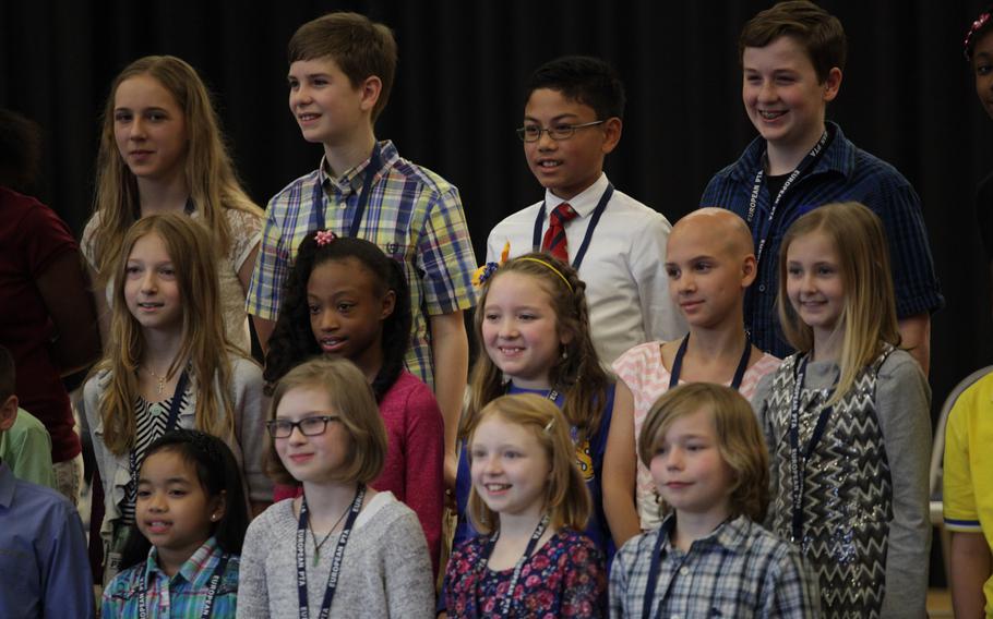 Competitors in the European PTA Spelling Bee pose for photos after the competition Saturday, March 21, 2015, at Ramstein Elementary School in Germany.