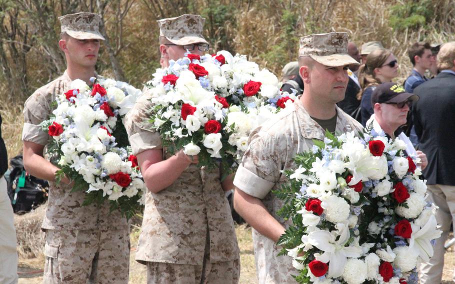 Marines lay a wreath at the ceremony commemorating the 70th anniversary of the Battle of Iwo Jima on March 21, 2015.

