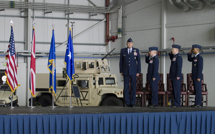 Lt. Gen. Bradley A. Heithold, commander of Air Force Special Operations, and commanders from the 352nd Special Operations Wing stand for the opening of an activation ceremony at RAF Mildenhall, England, on Monday, March 23, 2015. The ceremony marked the deactivation of the 352nd Special Operations Group and its subsequent reactivation as a wing.

Adam L. Mathis/Stars and Stripes