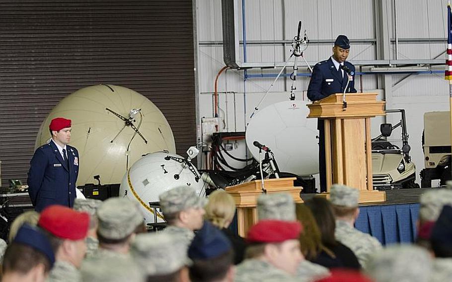 Col. Eric V. Faison speaks after accepting command of the 352nd Special Operations Maintenance Group at RAF Mildenhall, England, on Monday, March 23, 2015. The 352nd Special Operations Wing is set to move to Spangdahlem Air Base, Germany, in the next few years.

Adam L. Mathis/Stars and Stripes
