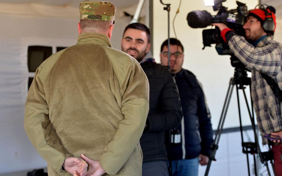 Lt. Gen. Ben Hodges, U.S. Army Europe commande, is interviewed by a Romanian television crew at the Smarden Training Area in Romania, on Tuesday, March 24, 2015, following a parachute jump by the 173rd Airborne Brigade.