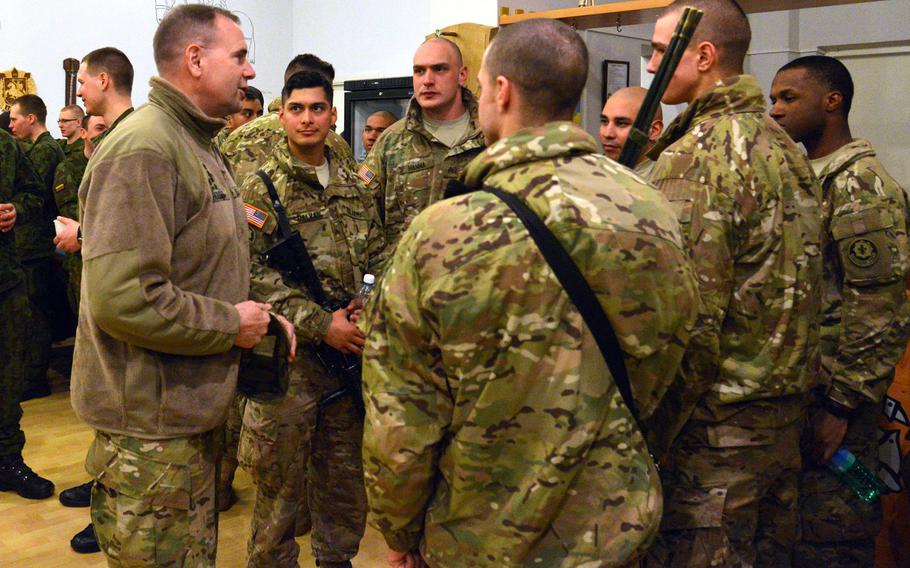 Lt. Gen. Ben Hodges, left, talks to soldiers of  Troop L, 3rd Squadron, 2nd Cavalry Regiment in Alytus, Lithuania, on Sunday, March 22, 2015. The soldiers had been training in Lithuania and were then taking part in the regiment's Dragoon Ride from Lithuania and Estonia to their home base in Vilseck, Germany.
