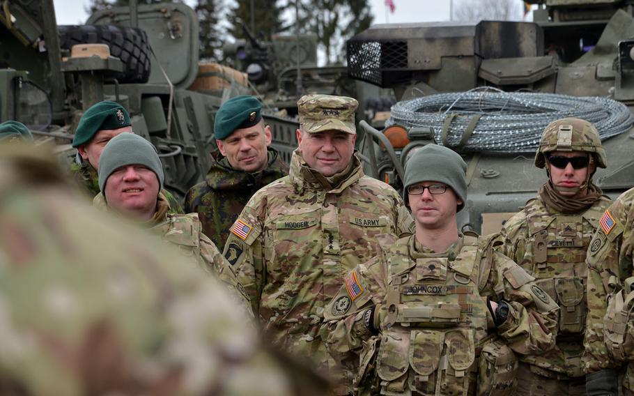 Lt. Gen. Ben Hodges, center, listens to a convoy brief in Alytus, Lithuania, onMonday, March 23, 2015. Hodges, U.S. Army Europe commander, and the soldiers of Troop L were preparing for 3rd Squadron, 2nd Cavalry Regiment's Dragoon Ride from Lithuania and Estonia to their home base in Vilseck, Germany.