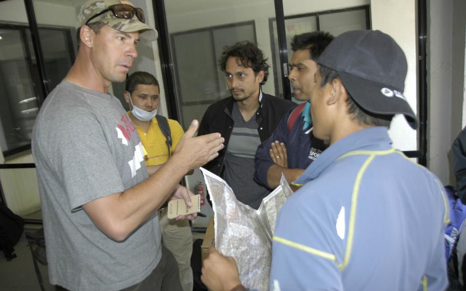Nick Mrzlak, 42, of Farmington, N.M., and a former Navy hospital corpsman, plans an aid mission with Nepalese men in Kathmandu, on Sunday, May 3, 2015.


Seth Robson/Stars and Stripes