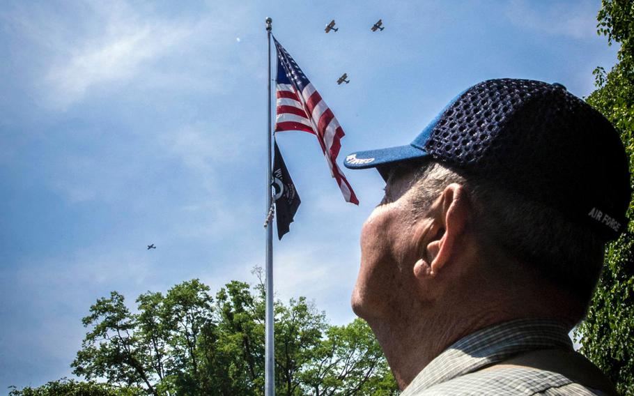 Korean War veteran Walter Derebeew, who escaped from Russia during World War II, attends the historic aircraft sweep over the National Mall in Washington, D.C. during the Arsenal of Democracy Flyover May 8, 2015, to commemorate the 70th anniversary of the World War II victory in Europe.