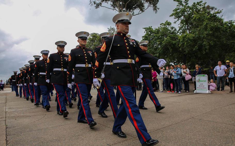 U.S. Marine Corps Gunnery Sgt. Allen Lee, supply chief, 12th Marine Corps District, leads Marines of Marine Corps Recruit Depot San Diego in a parade during the centennial celebration of Balboa Park, May 9, 2015.