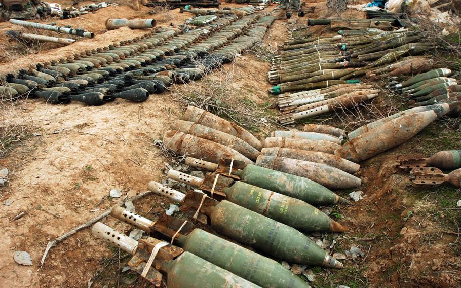 This combat camera photo shows mortar rounds and other ordnance found during an Iraqi army-led patrol of a village and surrounding areas near Hawija, Iraq, Feb. 20, 2006.

