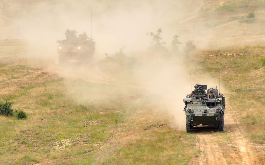 Strykers of 2nd Squadron, 2nd Cavalry Regiment roll across the Novo Selo Training Area, Bulgaria, Thursday June 25, 2015. Training at the base is set to increase in September, with the first of three planned six-month rotations of about 150 Marines.