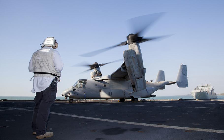 Crewmembers of the USNS Sacagawea conducts flight operations with a U.S. Marine Corps MV-22B Osprey, from Marine Medium Tiltrotor Squadron 265, 31st Marine Expeditionary Unit, during exercise Talisman Sabre 15, July 9, 2015.