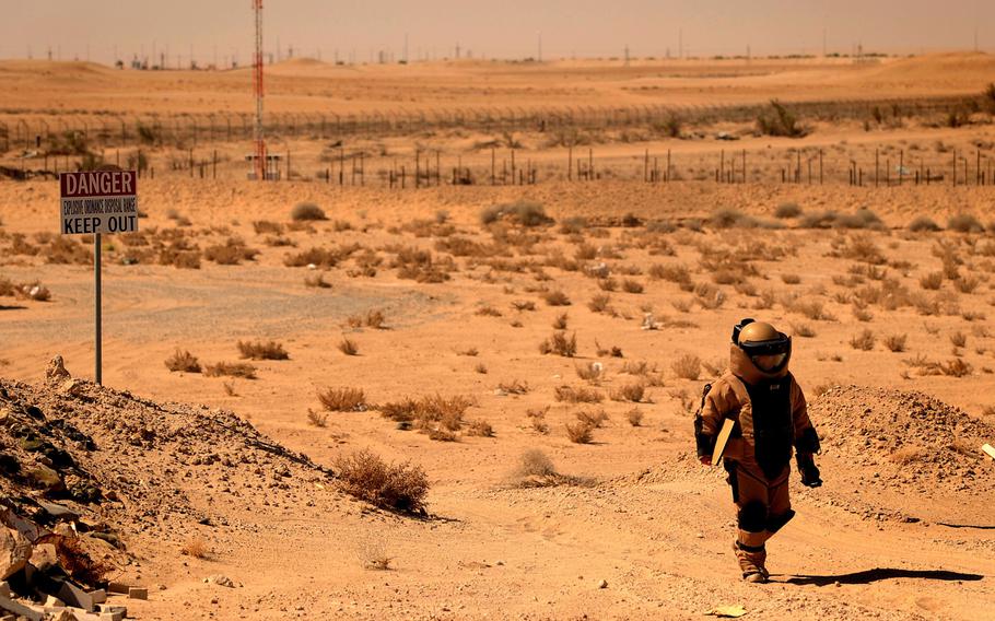 Tech. Sgt. Matthew Bingaman, a 386th Expeditionary Civil Engineer Squadron explosive ordnance disposal technician, returns from an improvised explosive device training scenario on Thursday, June 25, 2015, in Southwest Asia.
