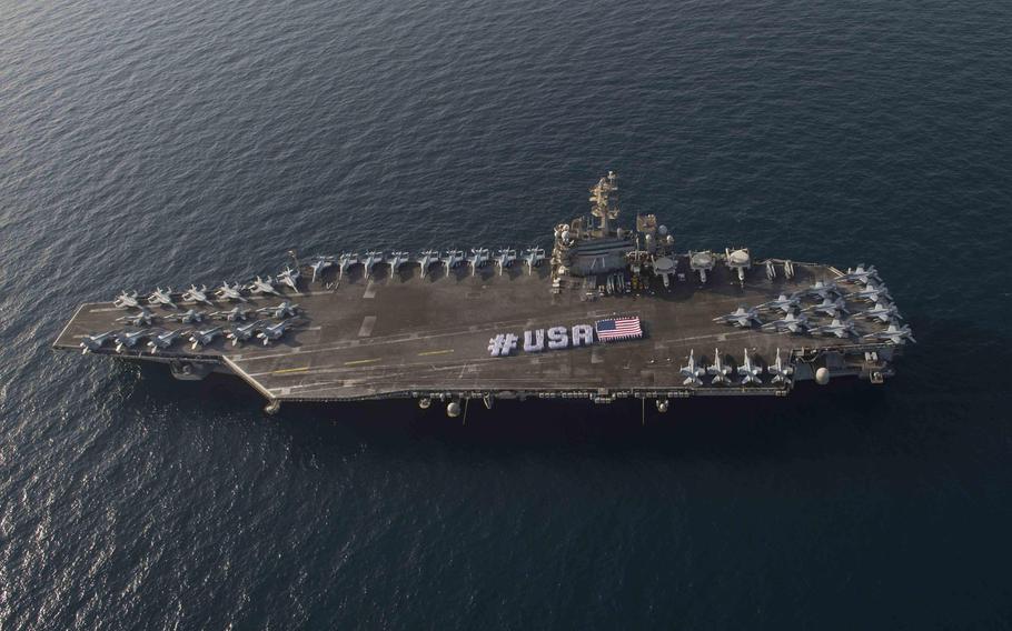 Sailors spelled out #USA on the flight deck of the aircraft carrier USS Theodore Roosevelt last month ahead of the Independence Day weekend. The Roosevelt, currently deployed in the Navy's 5th Fleet area of responsibility, arrived on a port visit to Bahrain Sunday, July 19, 2015.