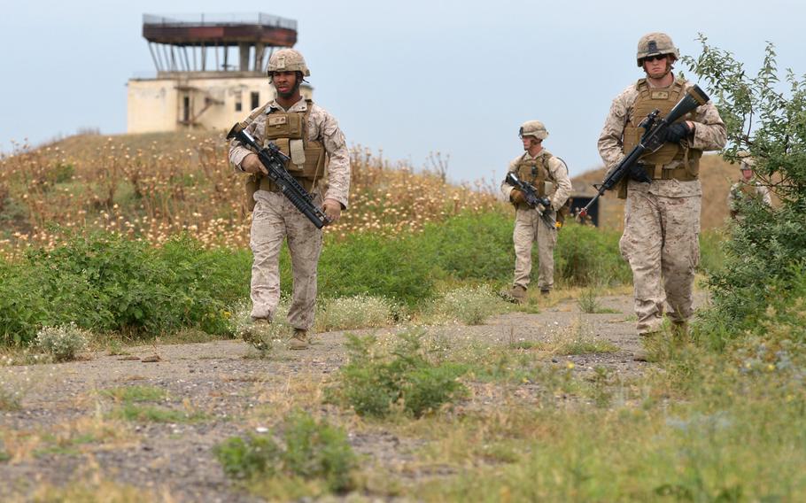 U.S. Marines go through a foot patrol drill at Agile Spirit 15, a training exercise in Vaziani, Georgia, Tuesday, July 14, 2015. The multinational exercise concluded Wednesday.