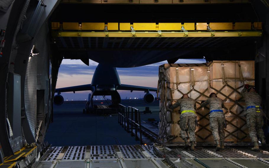 APEX students offload a pallet of household goods on Tuesday, July 7, 2015 onto a 60K tunner at Travis Air Force Base, Calif. Students were required to complete a minimum of 36 hours of hands-on training as part of the APEX training course.