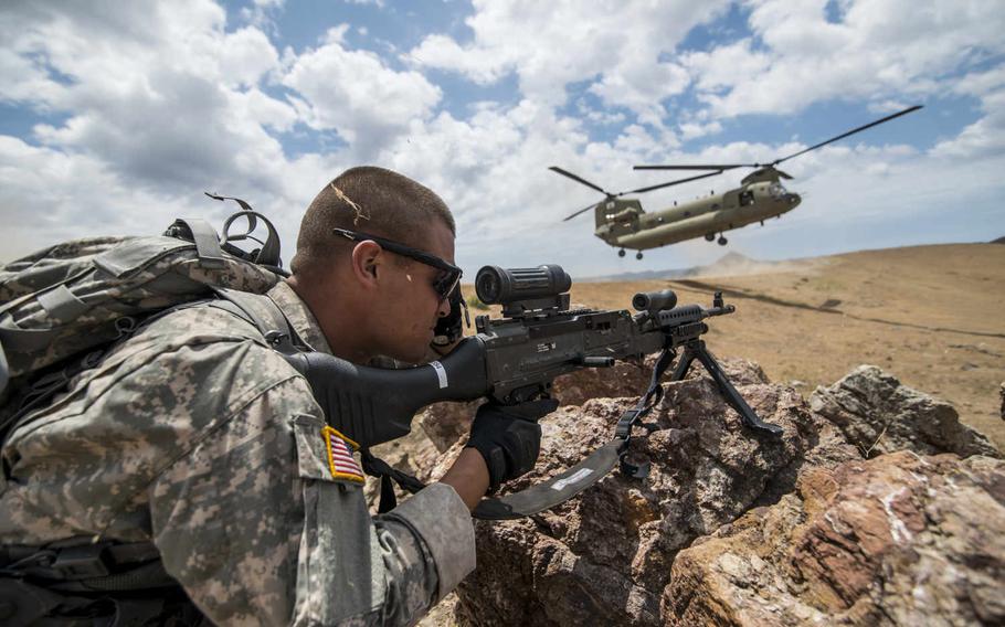 A U.S. Army Reserve combat engineer from the 374th Engineer Company covers a sector of fire during an air assault landing July 18, 2015, during a two-week field training exercise known as a Sapper Leader Course Prerequisite Training at Camp San Luis Obispo Military Installation, Calif.