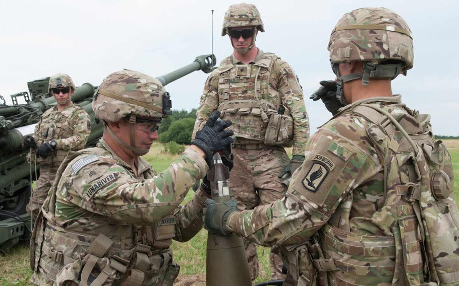 The fins, or canards, on the M1156 Precision Guidance Kit fuse are part of the guidance system that the Army says greatly increases accuracy of rounds. Here, soldiers from the 173rd Airborne Brigade Combat Team practice loading the shell before live fires at Vilseck, Germany, July 23, 2015.