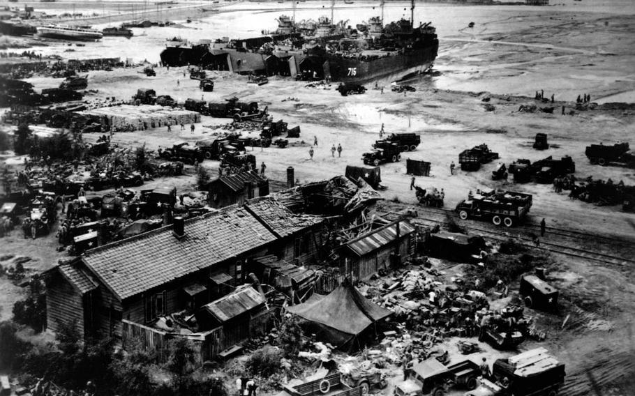 Land Ship Tanks unload at Wolmi-do, Inchon, Korea on D-plus and Marine trucks to take supplies to advancing troops. In 2011, a group of approximately 160 former residents of Wolmi Island filed suit against the government, seeking compensation for property lost during a September 1950 bombing of the island.