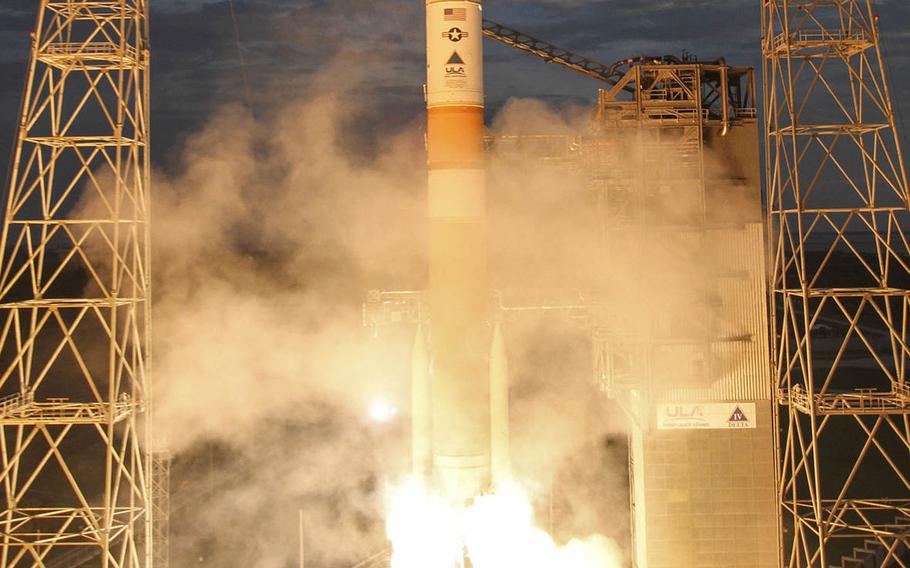 A Delta IV rocket carrying the seventh Wideband Global satcom satellite lifts off from Cape Canaveral Air Force Station, Fla., on Thursday, July 23, 2015.