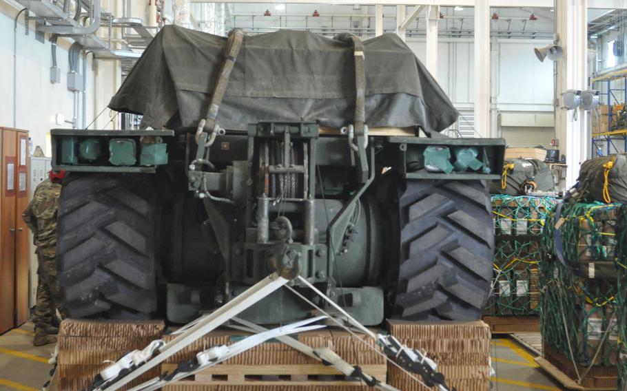 This 40,000 pound bulldozer sitting in the heavy rigging facility at Aviano Air Base, Italy, on Saturday, 9 April, 2016, has been rigged for an air drop onto an area near Hohenfels, Germany, that will host the Saber Junction exercise for the 173rd Airborne Brigade. It's the heaviest piece of equipment that will be dropped.