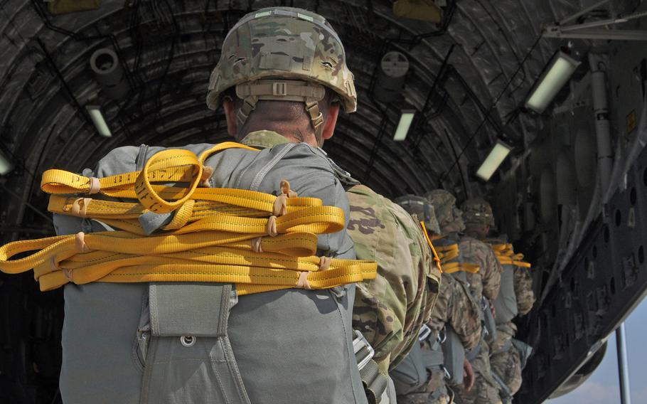 Soldiers from the 173rd Airborne Brigade enter a C-17 at Aviano Air Base, Italy, on Tuesday, April 12, 2016, before getting set to jump into Hohenfels, Germany, a few hours later as part of exercise Saber Junction.