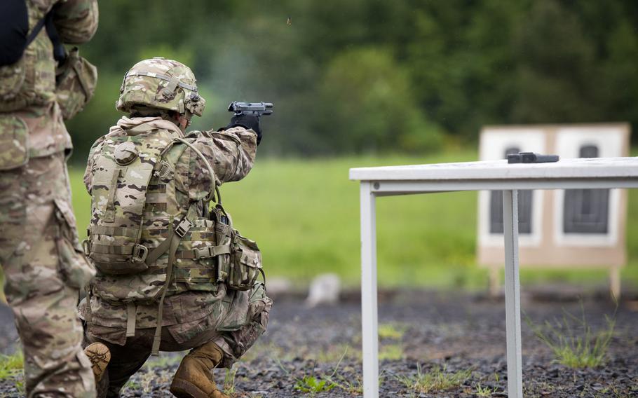 Sgt. Vanessa Carrillo fires at a target after a series of physical challenges as part of the the 21st Theater Sustainment Command Best Warrior Competition in Baumholder, Germany, on Monday, May 23, 2016.