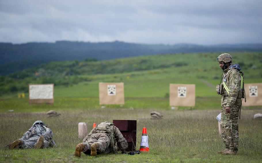 Soldiers perform a series of physical challenges before firing their rifles as part of the the 21st Theater Sustainment Command Best Warrior Competition in Baumholder, Germany, on Monday, May 23, 2016.