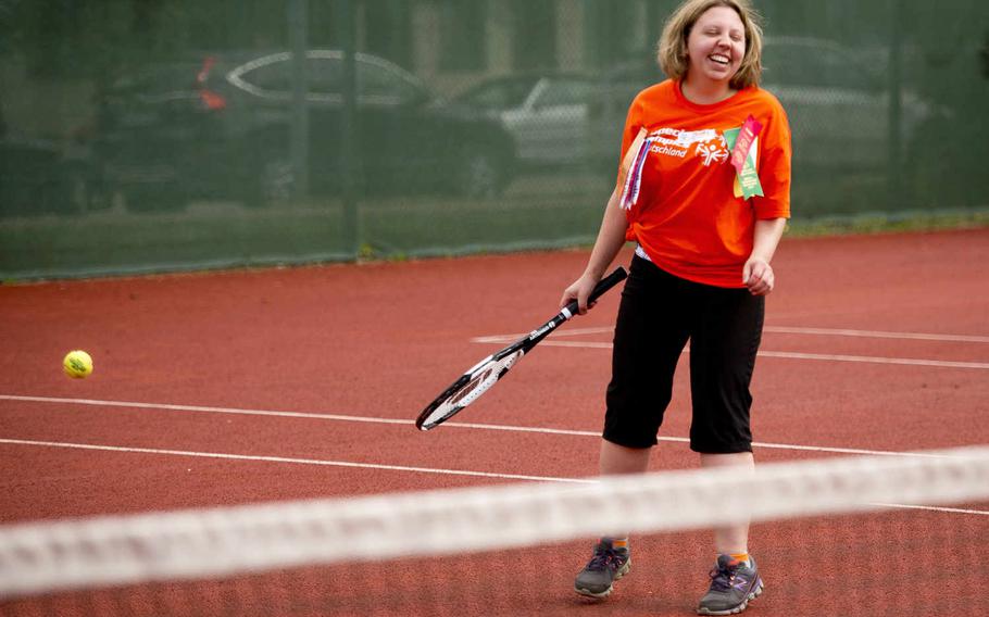 Wiesbaden's Shelley Addington laughs after missing a serve during the Spring Special Olympics at Ramstein Air Base, Germany, on Friday, June 3, 2016. 

Michael B. Keller/Stars and Stripes
