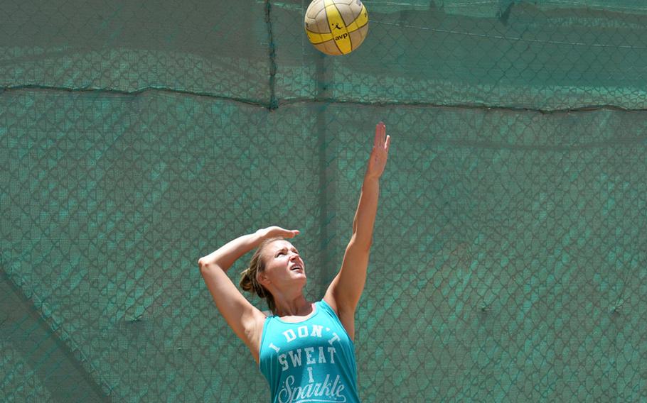 Lynn Walroth serves during a volleyball tournament at the U.S. Embassy in Kabul, May 28, 2016, part of a four-day fitness festival meant to encourage embassy workers to stay active and achieve their fitness goals.