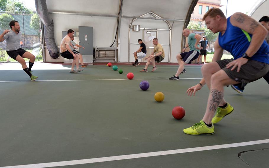A dodge ball tournament during the Kabul Fitness Festival at the U.S. Embassy in the Afghan capital on May 28, 2016, pitted groups of embassy workers and military servicemembers against one another, like these U.S. Agency for International Development employees and U.S. Marines.