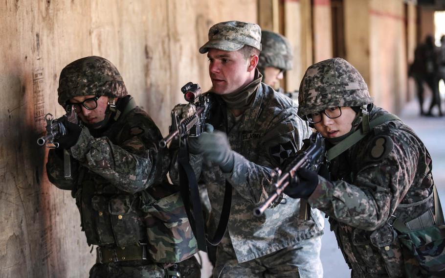 U.S. soldiers assigned to 3rd Infantry Regiment and South Korean soldiers with the 137th Battalion conduct an urban breaching at Rodriguez Live Fire Range, South Korea, March 9, 2016. The training was part of Pacific Pathways, which has been evolving in the three years since it began in 2014.