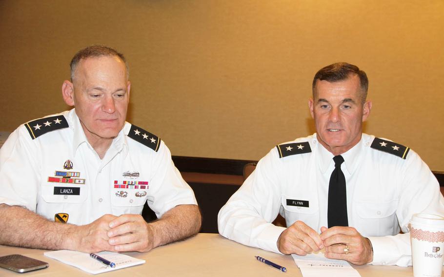 Lt. Gen. Stephen Lanza, left, I Corps commander, and Maj. Gen. Charles Flynn, 25th Infantry Division commander, speak to reporters about Pacific Pathways during a Honolulu conference in May 2016. Now in its third year, the Pacific Pathways has evolved a reverse strategy for this summer that will bring troops from partner nations to the United States.