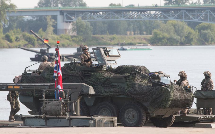 A 2nd Cavalry Regiment Stryker crosses the Vistula River in Chelmno, Poland, on Wednesday, June 8, 2016. The U.S. Army cavalry unit is en route to Tapa, Estonia, to begin Saber Strike 16, a multinational training exercise.